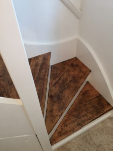 Staircase including treads sanded down and repainted and varnished in West Runton.